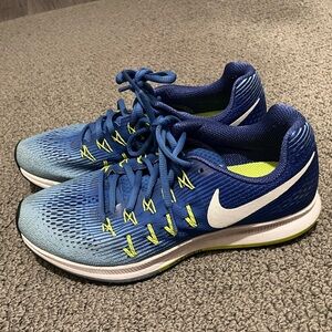 Nike Women's Blue Gradient Running Shoes with White Swoosh and Yellow Accents